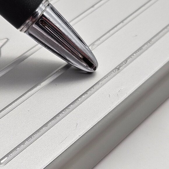 RIMOWA iPhone 14 Pro Max Case – Good Condition, Minor Scratches, Priced to Sell - Picture 4 of 11